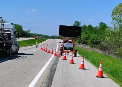 Traffic Control Company Placing Cones on Highway in Indiana Working Stopping Traffic